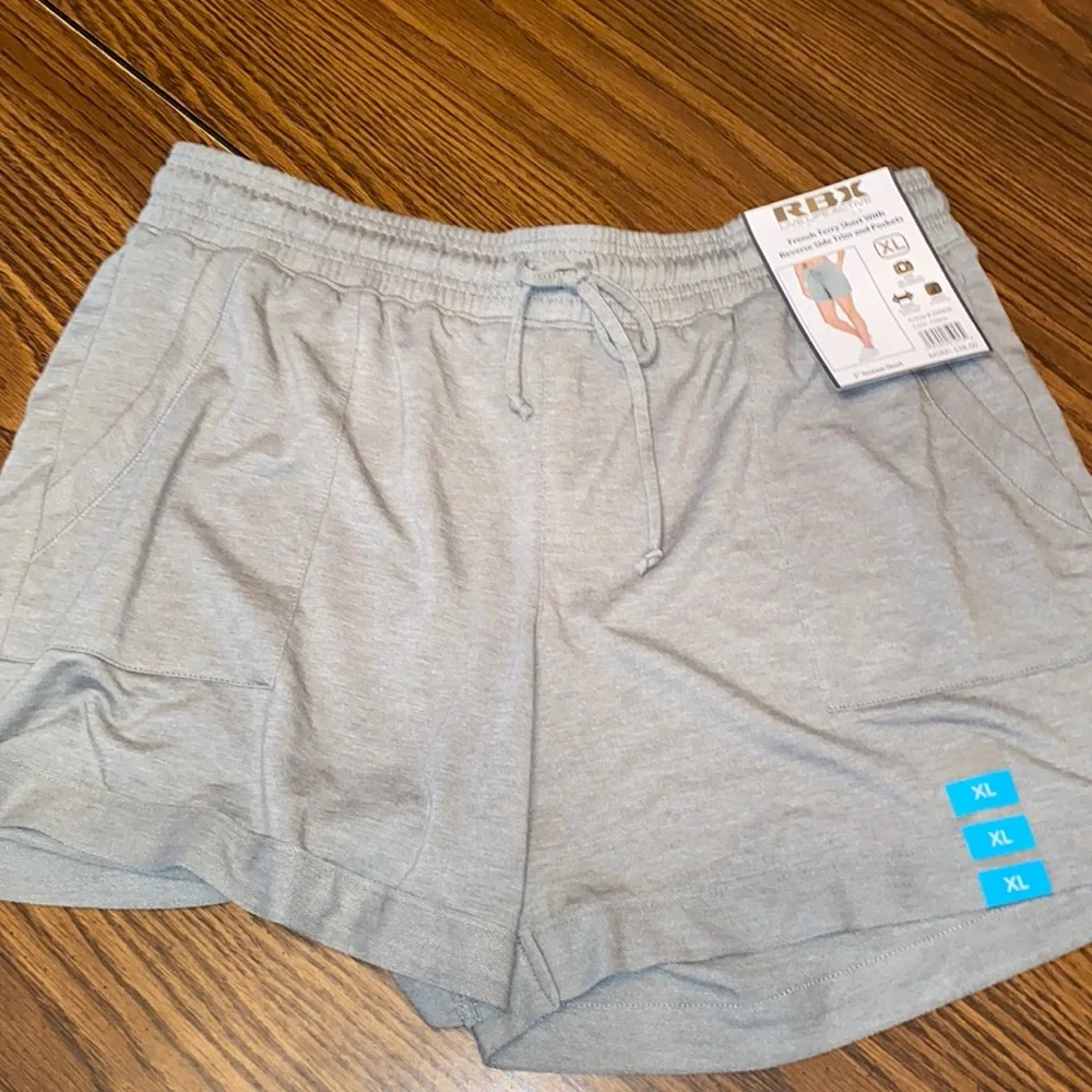Womanβs XL RBX Celery color athletic shorts NWT - Picture 1 of 5